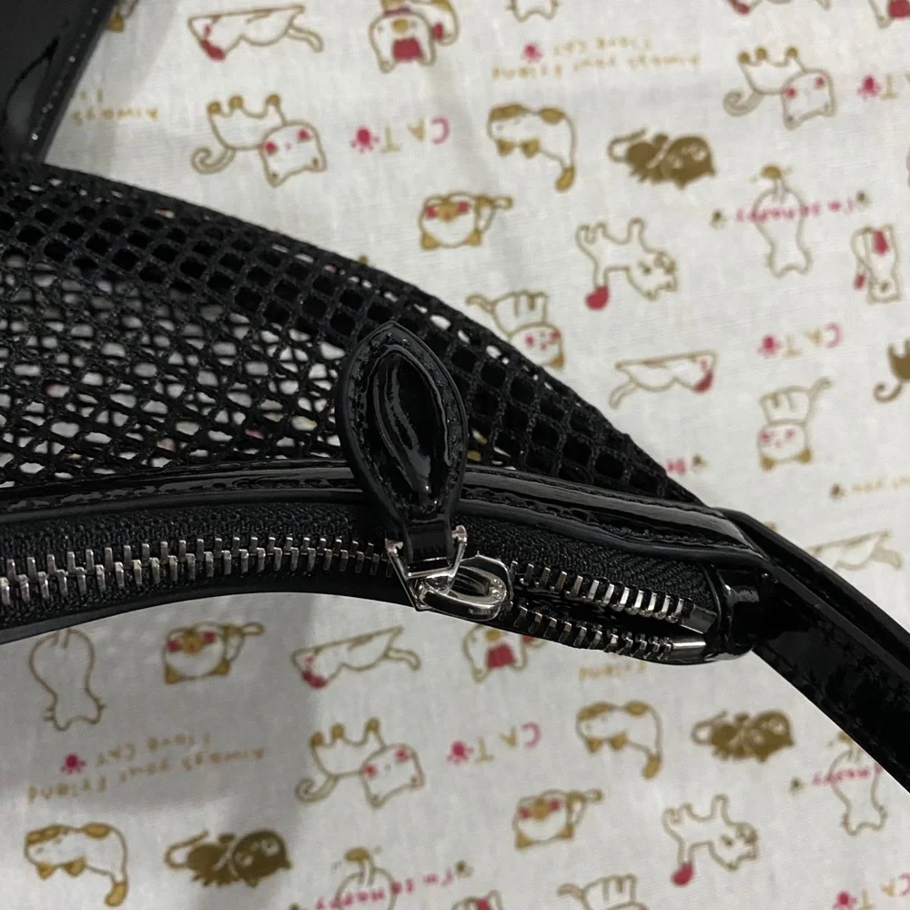 Alaïa Black Woven Crescent Shoulder Bag